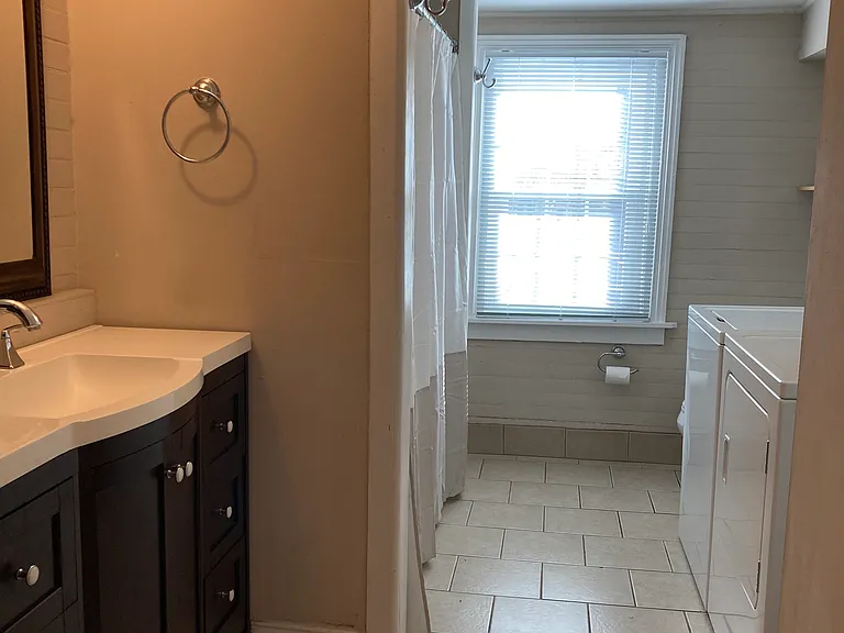 2nd floor main bathroom with full size washer and dryer.