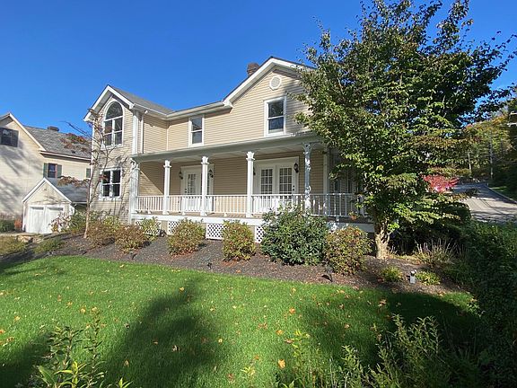 Porch. Relax on the spacious wrap-around porch. French doors allow easy access.