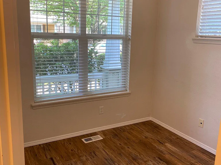 Den, with large storage closet