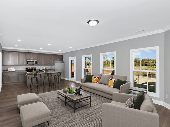 The kitchen, great room, and outdoor living spaces seamlessly flow together to give you a great at h