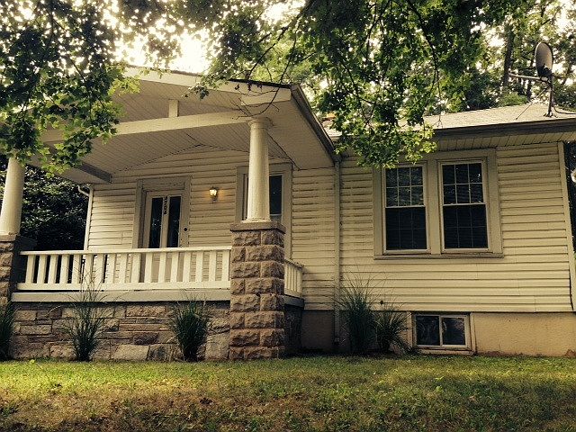 Cozy front porch on quiet street.