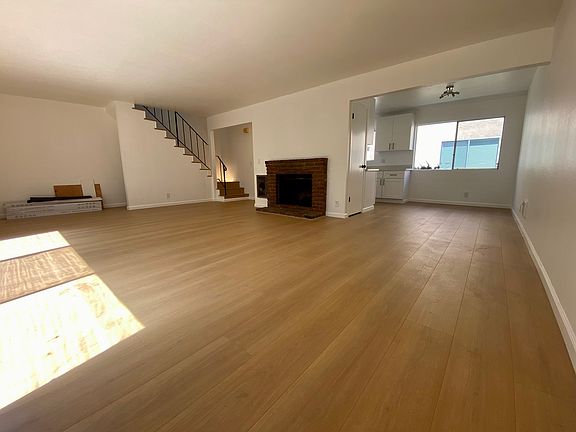 All newly remodeled: Large living room area - New floors, kitchen, bedrooms, and bathrooms. Fresh & bright.