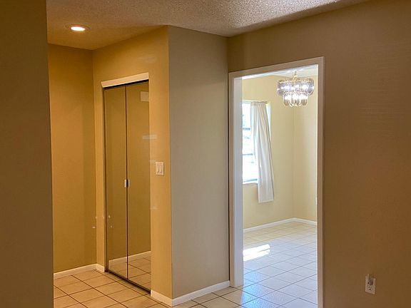Entry to left, kitchen to right (view from living room)