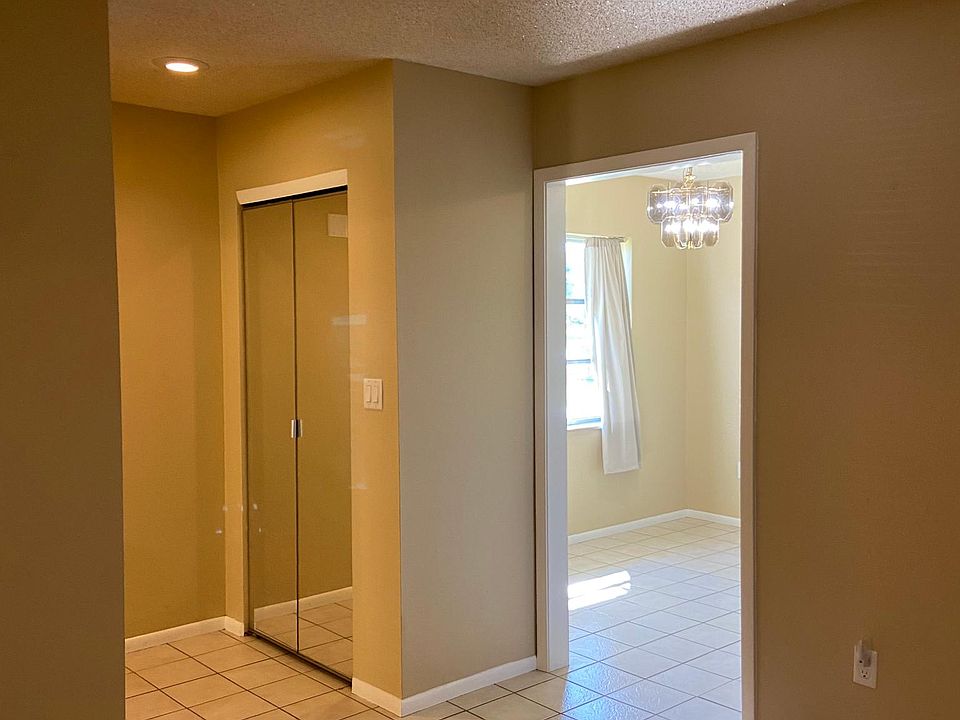 Entry to left, kitchen to right (view from living room)