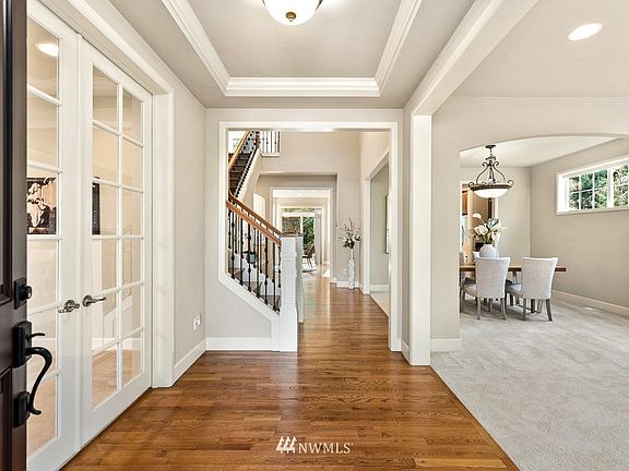 Arch walls and  gorgeous trim millwork throughout.