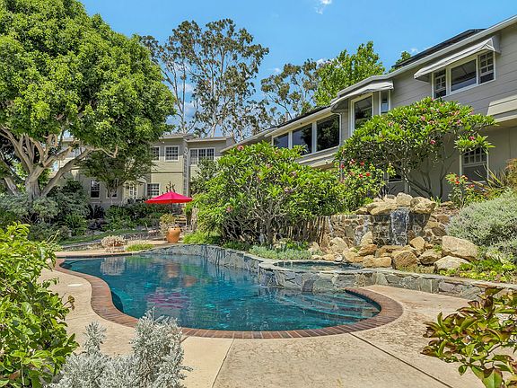 pool with waterfall and spa
