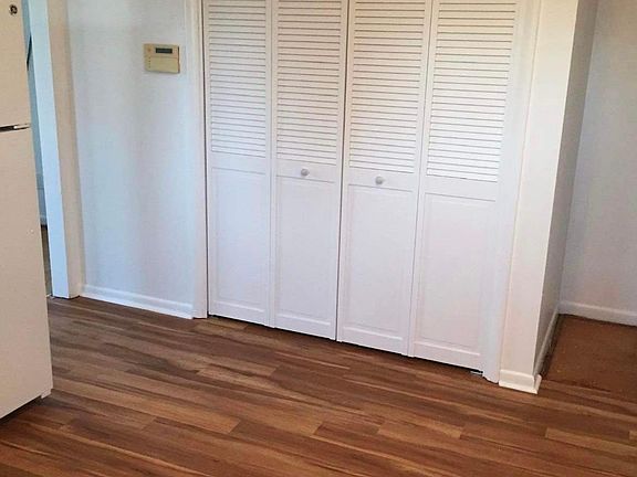 Kitchen and Utility Room. The utility room is behind the folding doors.