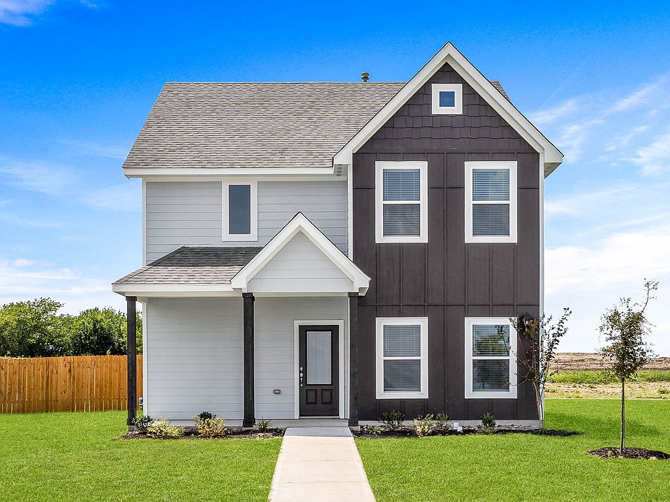 The Camellia is a beautiful two story home with an attached two-car garage and welcoming front porch.