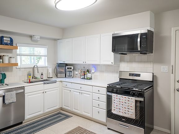 Door to backyard in kitchen
