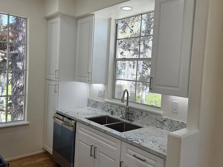 View of sink and dishwasher.