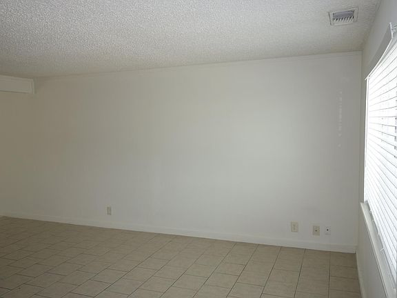 Inside the front door looking into the living room