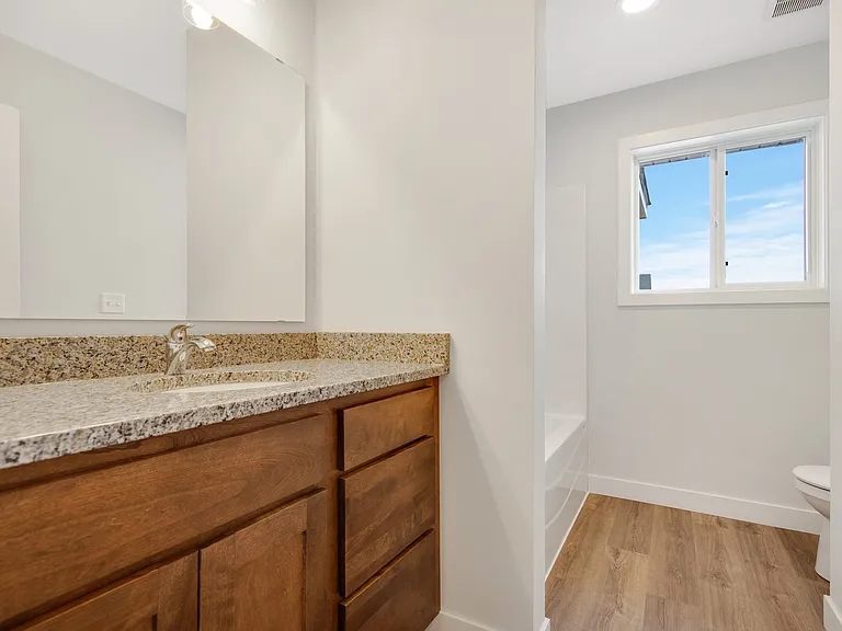 Main Bath With Tub & Shower.