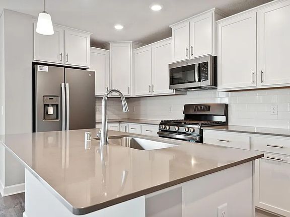 2nd image of 11022 Zest St NE Unit E