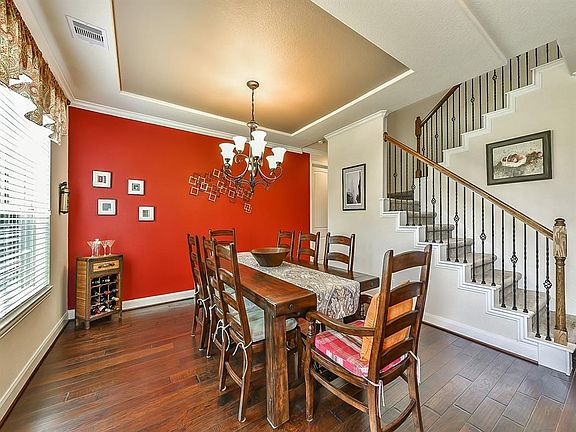 Dining Room has plenty of space for a large table.  Beautiful wood floors!