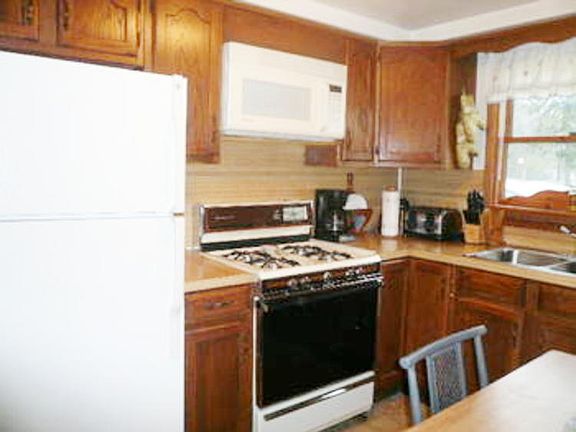 This step saving kitchen has lot's of storage, but if one would need or want more storage, there's a nearby pantry off the adjacent mudroom!