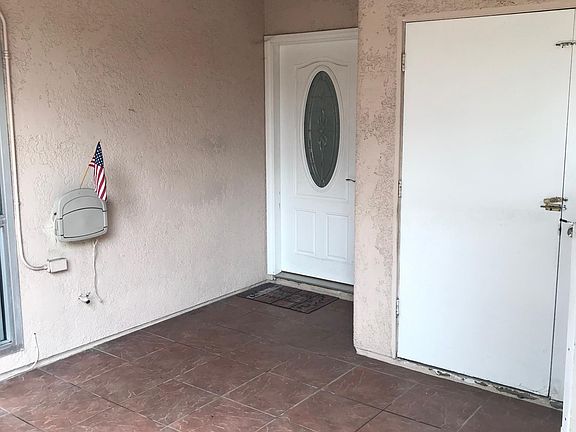 Travertine tiled patio with cable, water and power. Locking storage