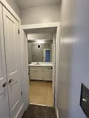 Closet space in hall to bathroom