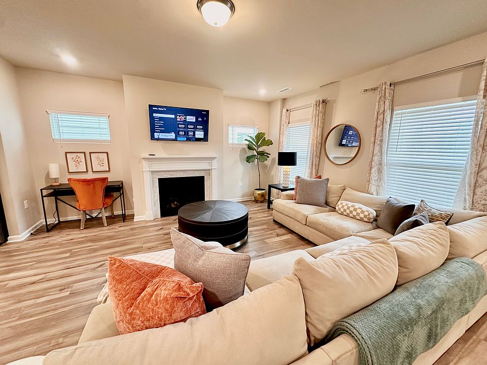 Large open living room with large sofa. Guaranteed one of the most soft and comfortable sofa's you ever relaxed on