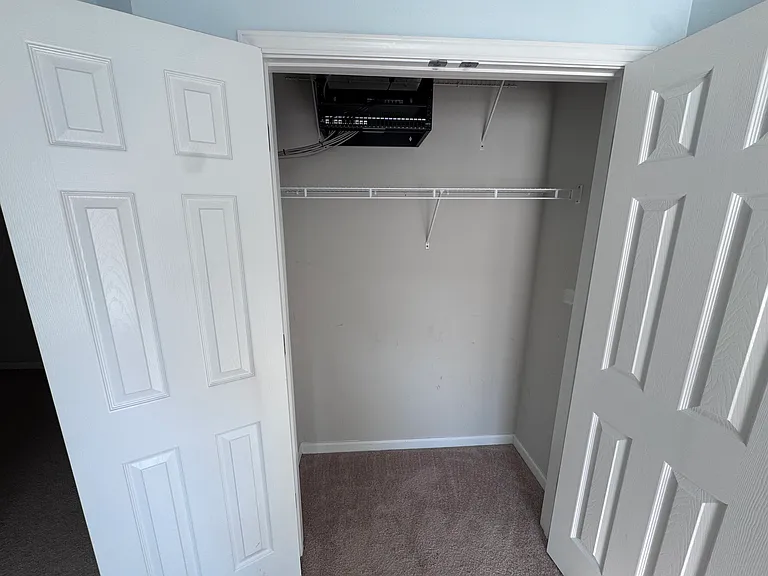 Upstairs bedroom #3 closet (network rack for hardwired ethernet jacks throughout house).