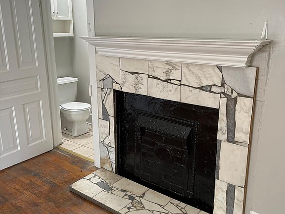 Bedroom and 1/2 bath. Fireplace for esthetics only.