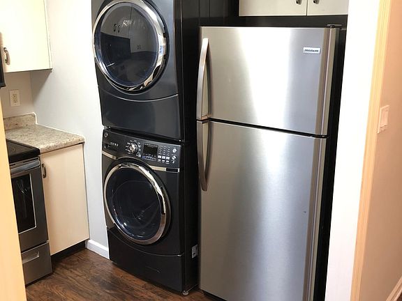 in unit washer and dryer; brand new refrigerator