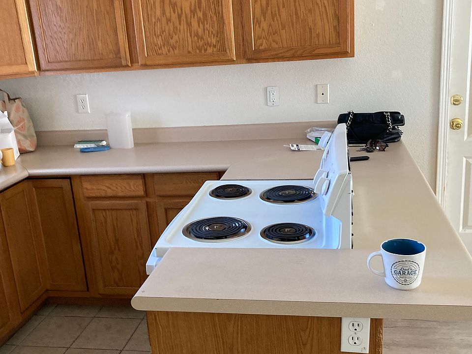 Kitchen area and electric stove.
