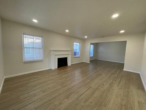 Spacious living room with recessed lighting