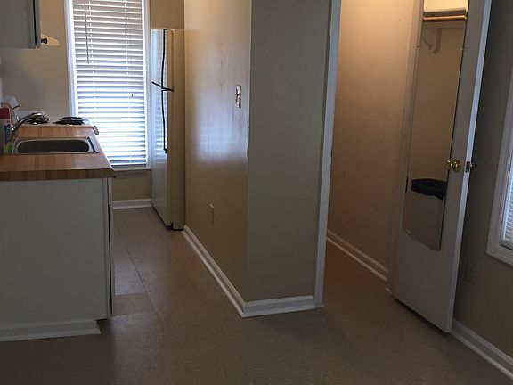 Walk-in Closet with shelving.