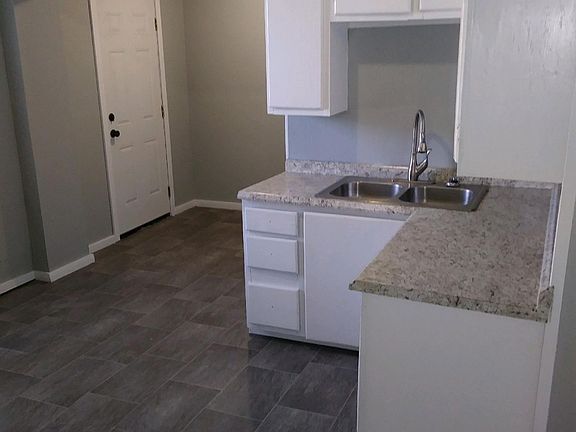 Brand new renovated kitchen with updated floor-to-ceiling ca