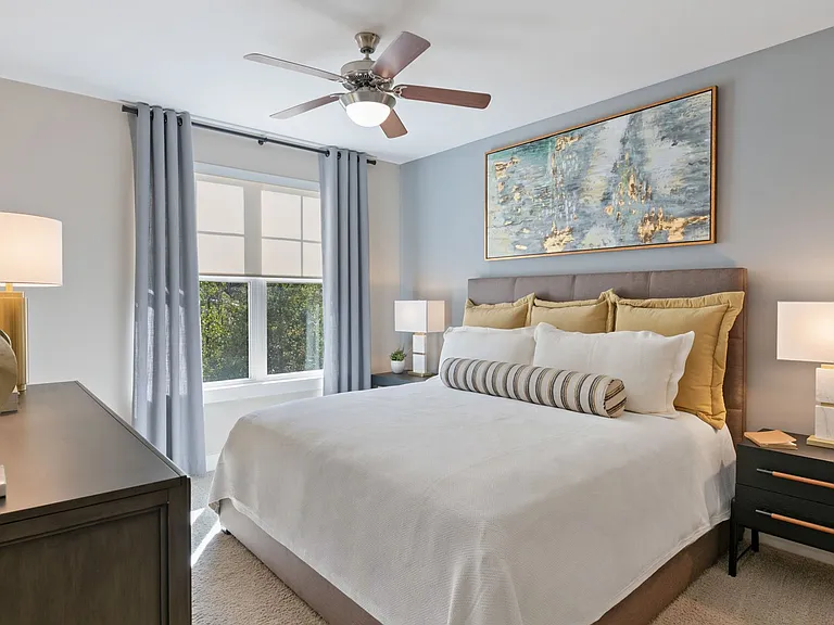 Bedrooms and living room with solar window shades and ample space