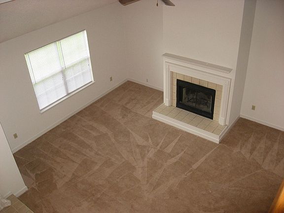 Open Family Room w/ Wood Buring Fireplace