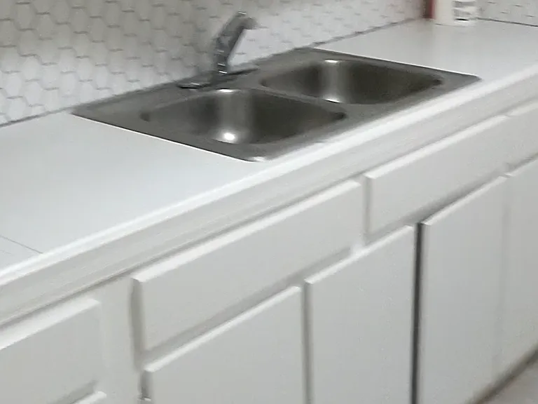 Double sink, tile countertop