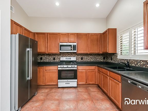2nd image of 6874 W Dovewood Way