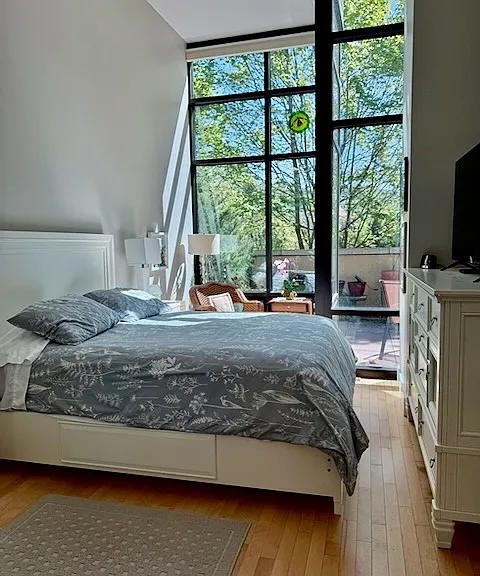 Stunning natural light in master bedroom.