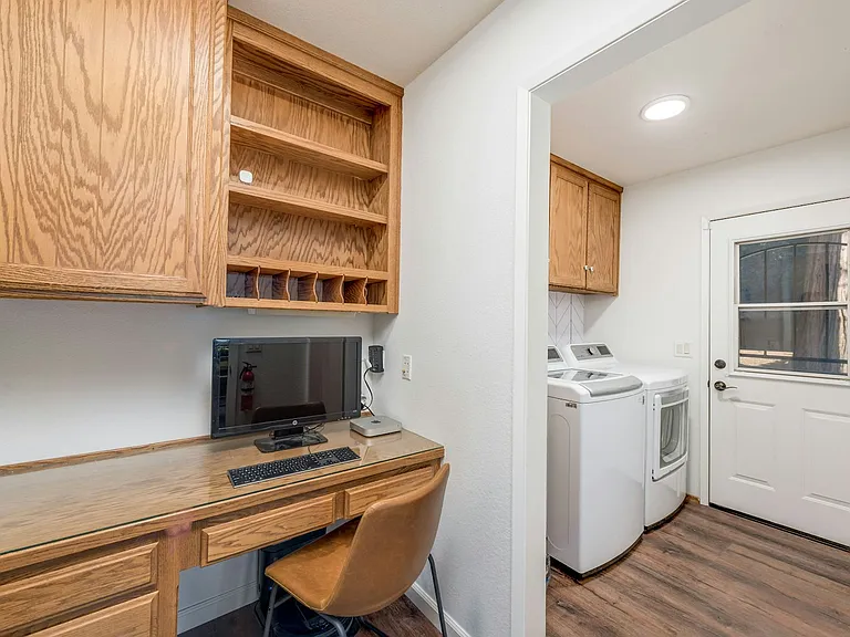 Utility room with computer space