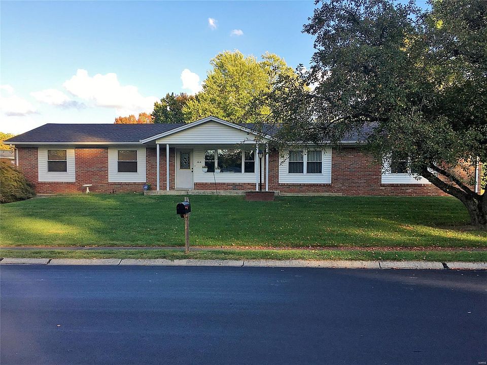 Full brick front with side entry garage.