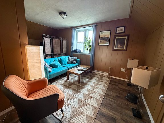 living room and bonus area for gym/ office