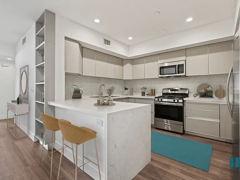 Full-Size Kitchen with Energy-Effcient Appliances and Ample Cabinet Storage