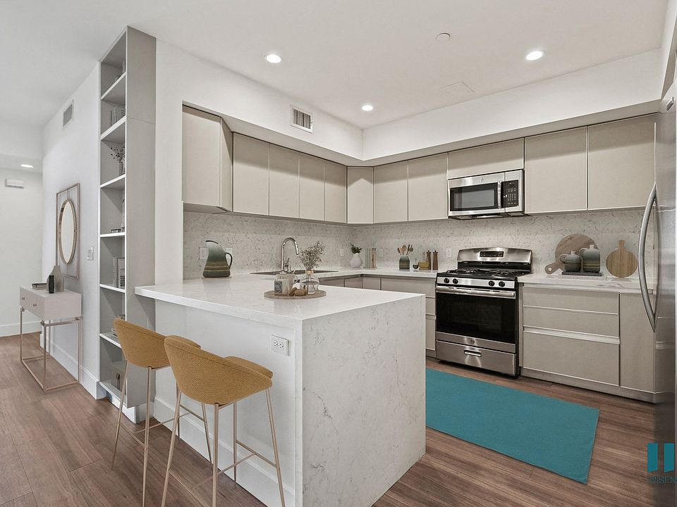 Full-Size Kitchen with Energy-Effcient Appliances and Ample Cabinet Storage