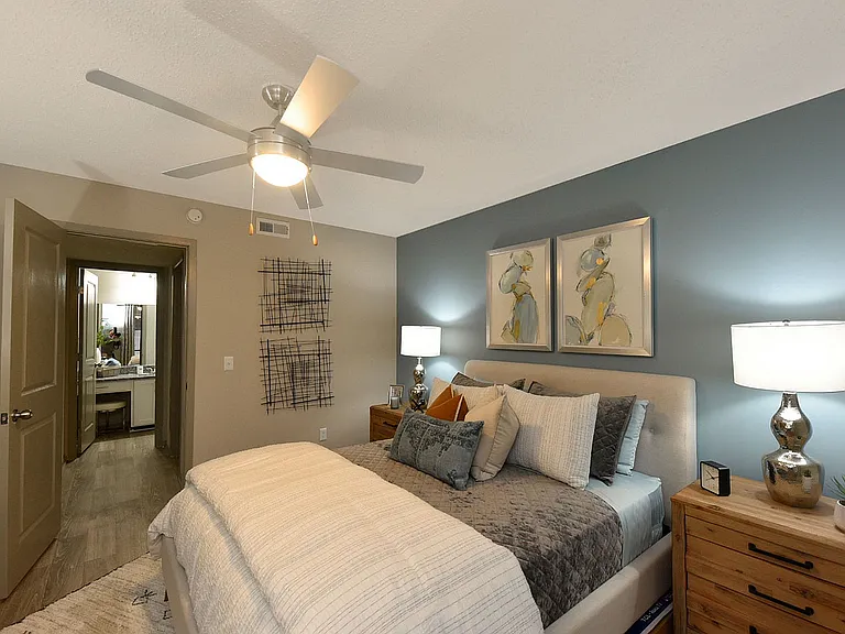 Cozy bedroom with ceiling fan