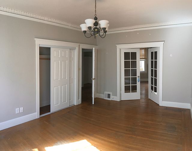 Bedroom and sliding door closet.