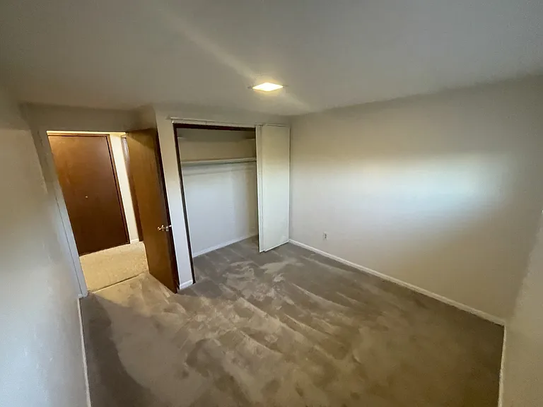 Two bedrooms. Black-out blinds installed throughout apartment.