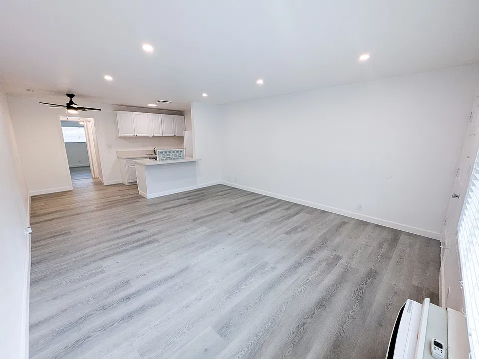 Wide_open living room comfort inside this modern 1_bedroom apartment