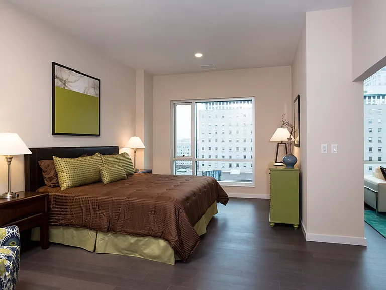 Seven at Broadway bedroom and view of city