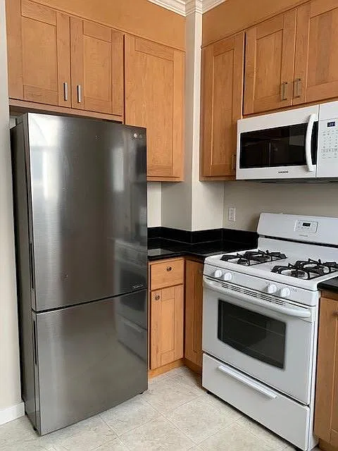LG fridge and gas stove with microwave.