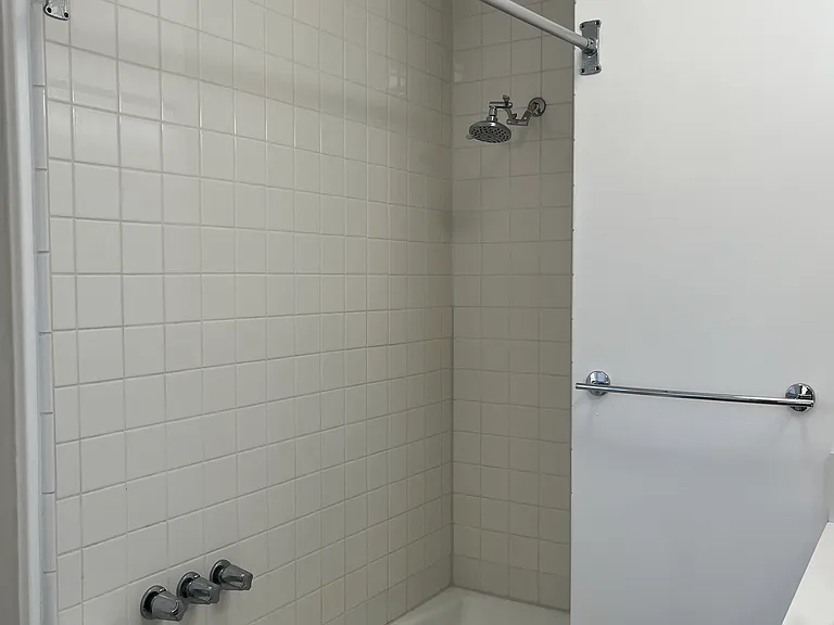 BATHROOM: NEW WHITE TILE TUB/SHOWER