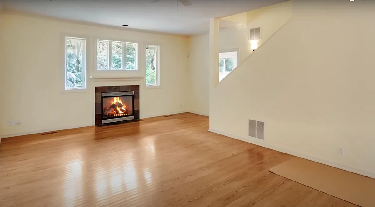 Spacious living room with hardwood floors and cozy fireplace - 3345 Quail Ridge Ct