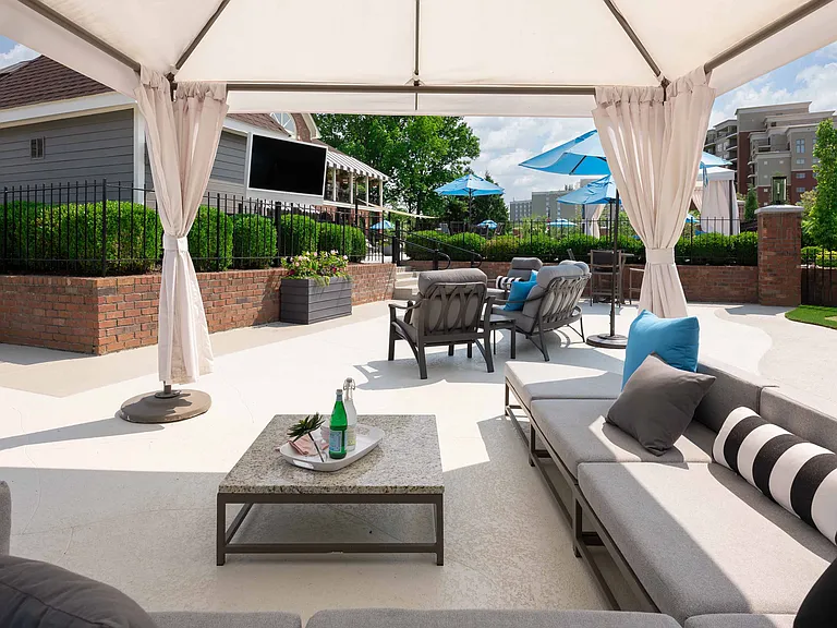 Luxurious poolside cabana with lounge seating
