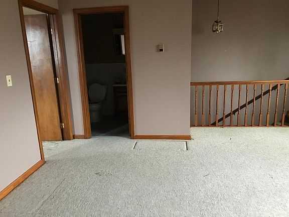 Top floor has foyer, living room, master bedroom and full bathroom.