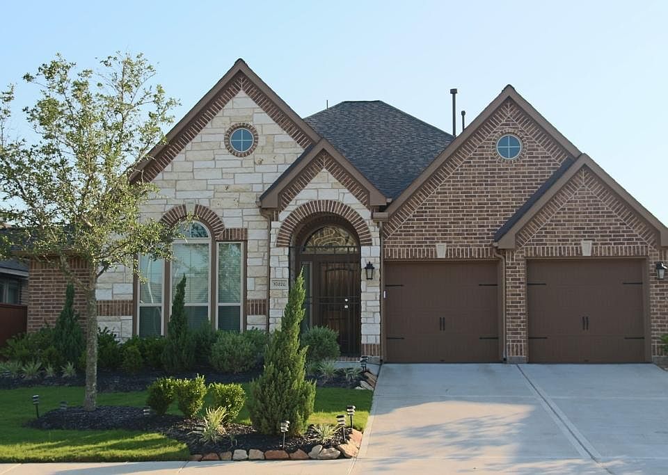 Stone and Brick elevation with custom gate!